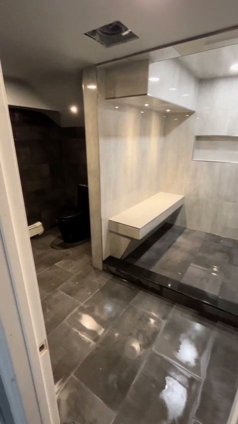 Curbless Shower on a Concrete Slab: How the Floor Gets Sloped