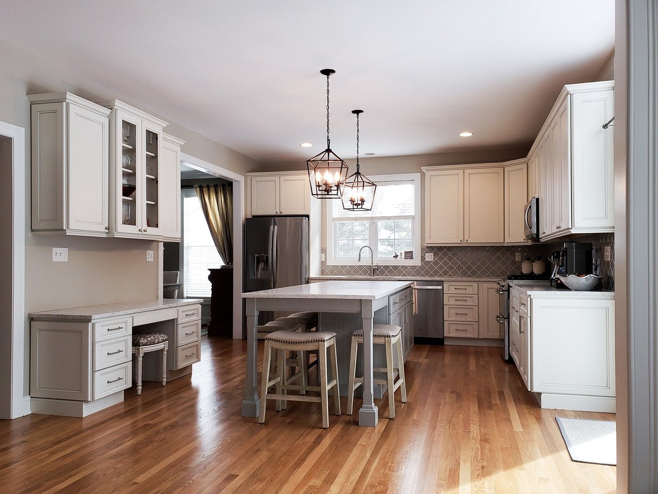 Renovated kitchen with a center island and new cabinetry