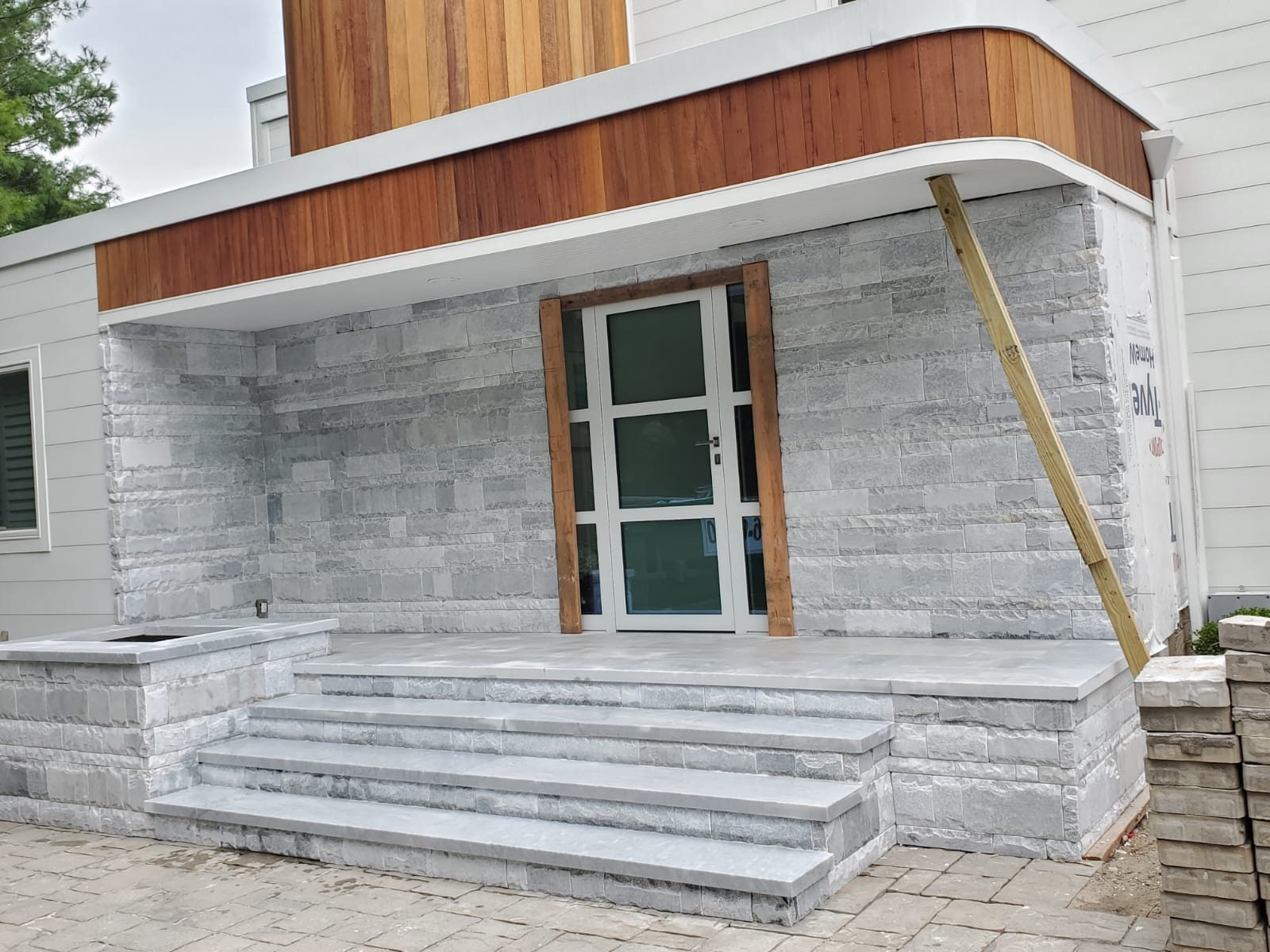 Where Siding Meets the Stoop: Fixing the Bottom Course That Traps Water