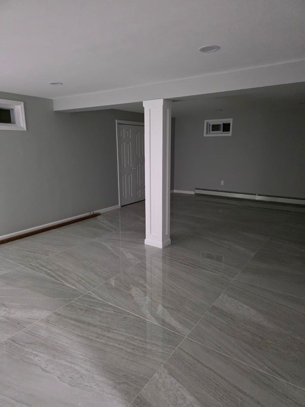 Finished basement floor by JDG Concrete & Construction