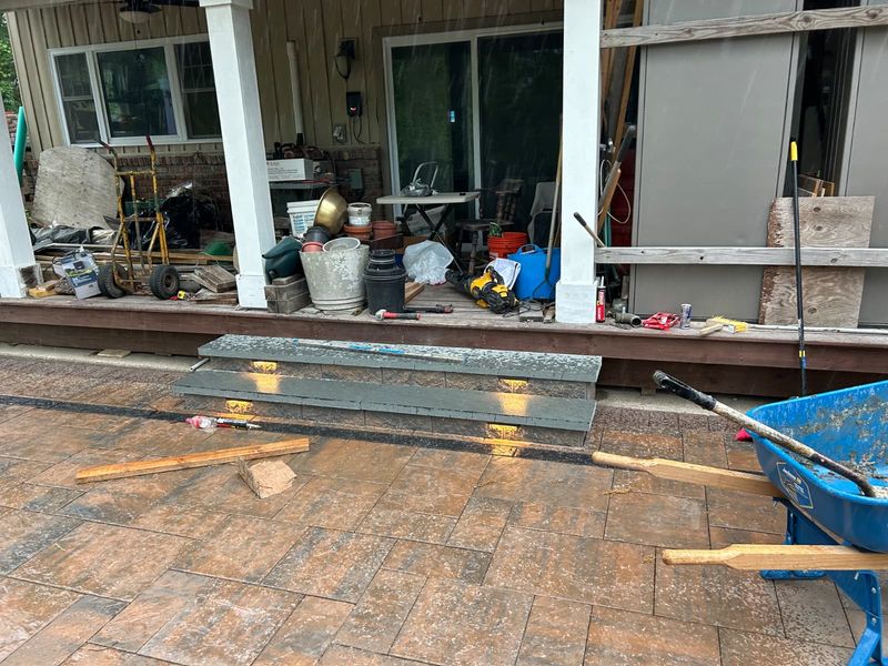 Patio tied into the back steps by JDG Concrete & Construction