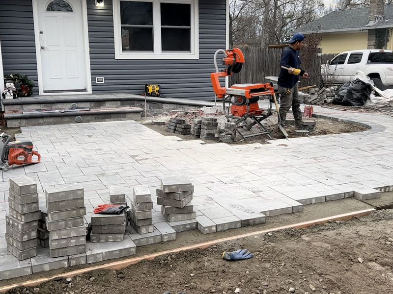 Patio field laid, cutting to the edges by JDG Concrete & Construction