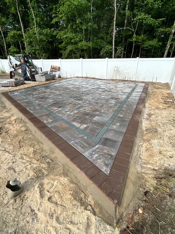 Field pavers down, border swept by JDG Concrete & Construction