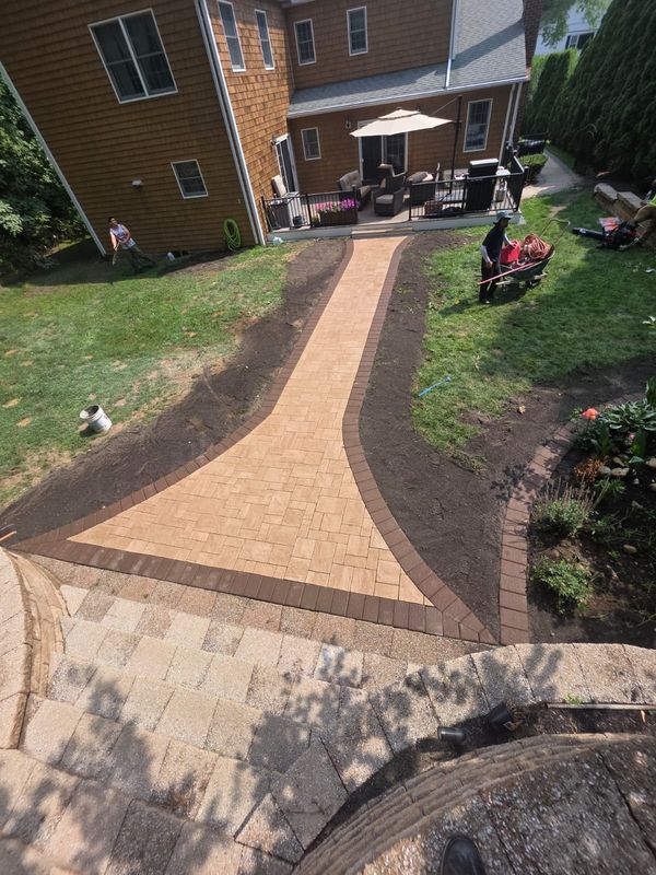 Walkway and steps from above by JDG Concrete & Construction