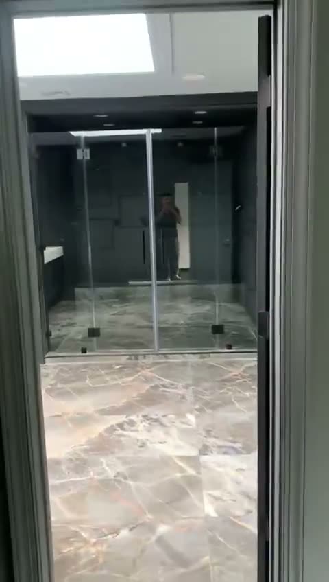 Master bath shower and vanity, short clip by JDG Concrete & Construction